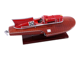 a model of a red race car on a stand