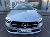 the front of a silver mercedes cla parked in a parking lot