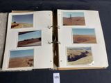 an open book with pictures of a landscape on it