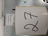 a sign that has been written on the side of a refrigerator