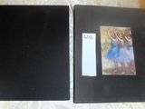 two books that are sitting on a table
