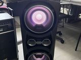 a speaker that is sitting in the middle of a room