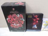 a box of roses and a box of cards on a table