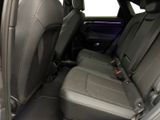two seats in the back of a car with a seat belt