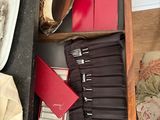 a drawer that has a bunch of different items in it