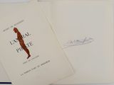 an open book with a drawing of a woman on it