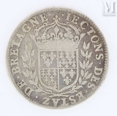an old silver coin with a coat of arms on it