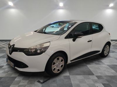 the white car is parked on a checkered floor in the garage