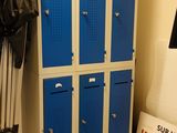 a picture of a locker in a room with blue lockers