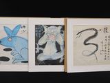 three paintings of a cat and a snake on a black background