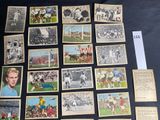 a lot of old football cards on display on the table