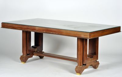 Table de salle à manger en bois de placage, le plateau légèr… - Photo 1