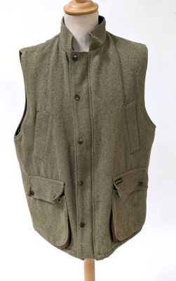 an image of a vest on a mannequin stand