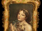 tableau représentant une femme tenant un chien, dans un cadre doré sur fond noir