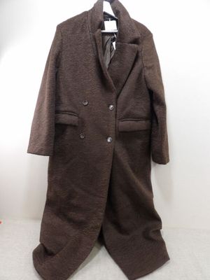 a coat and tie hanging on a hanger