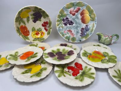 a lot of plates with different designs on them