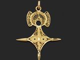 une image représentant un pendentif en or orné d'une croix