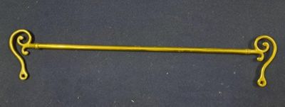 Un PORTE-GUIDE en laiton.