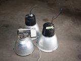 two lamps that are sitting on the ground next to each other
