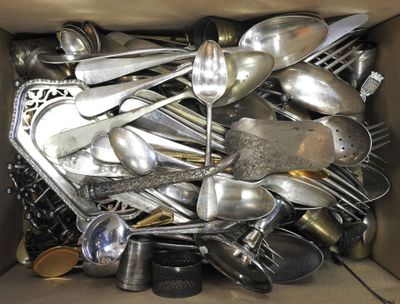 a box full of silver spoons and spoons in it