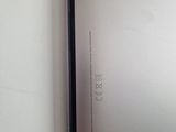 a close up of the back of an iphone with the screen missing