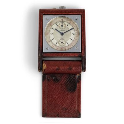 une image d'un gros plan d'une montre-bracelet sur un fond blanc