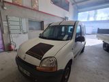 a white van that is parked in a garage