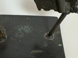 an old sewing machine sitting on top of a table