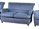 three blue chairs and a couch in a row on a white background