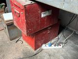 a red box that is under a metal structure