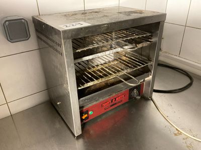 an image of an oven with a lot of food inside of it