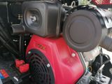 a close up of a small engine on a vehicle
