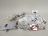 a pile of assorted fishing lures on a table