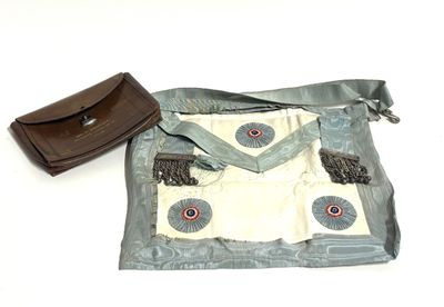 a purse and a wallet sitting on a table
