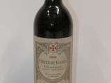 a bottle of wine that is sitting on a table