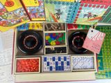 a box with a lot of game pieces in it