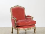 an image of a red chair with a gold frame