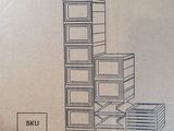 cardboard box with a drawing of a refrigerator inside of it