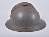 a helmet that is sitting on a white surface