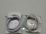 an image of a couple of cables sitting on top of a table