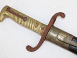 a knife that is laying on a table