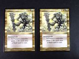 two cards of a card game with a picture of a gorilla and a gorilla