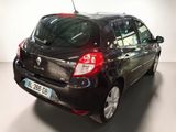 a picture of a black car parked in a garage