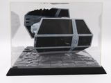 a model of a tie fighter in a display case