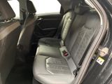 the back seat of a car with a seat belt in it