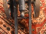 a small machine that is on a rug on the floor