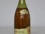 a bottle of wine that is sitting on a table