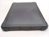 a tablet computer sitting on top of a white table
