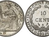 a silver coin with the image of a woman on it