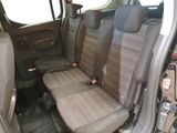 two seats in the back of a car that are empty